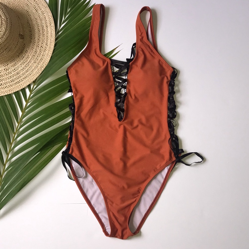 One piece terra-cotta orange swimsuit bathingsuit…